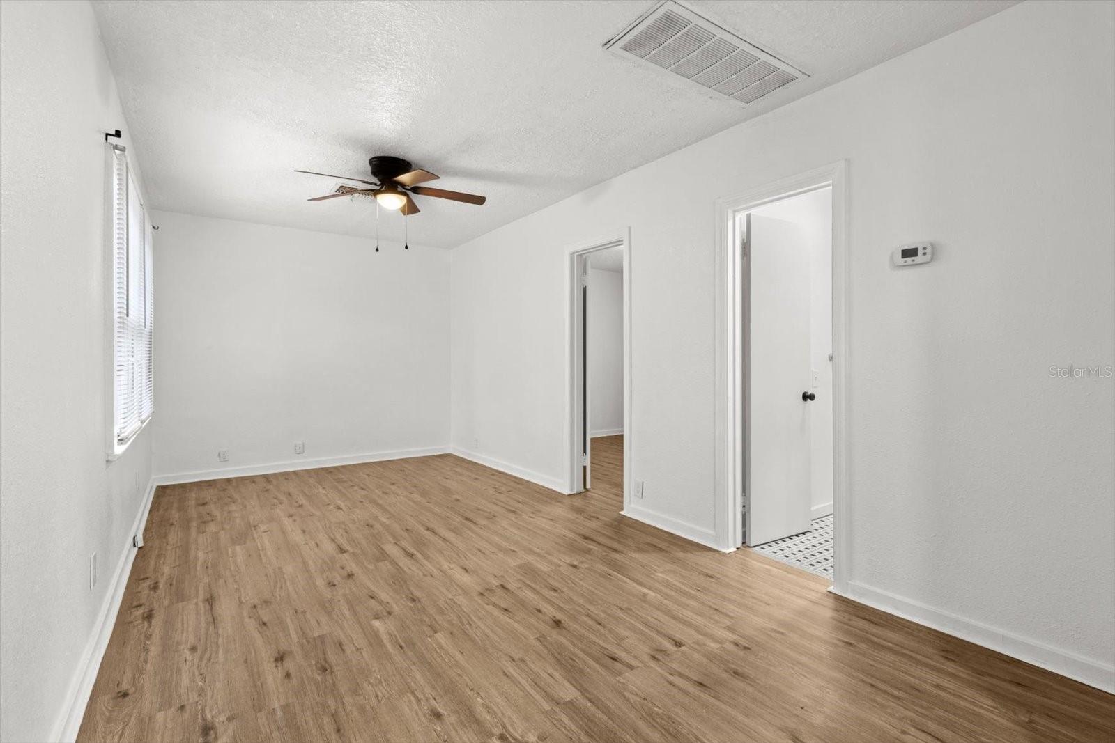 Living Room... Freshly Painted & New Laminate Flooring