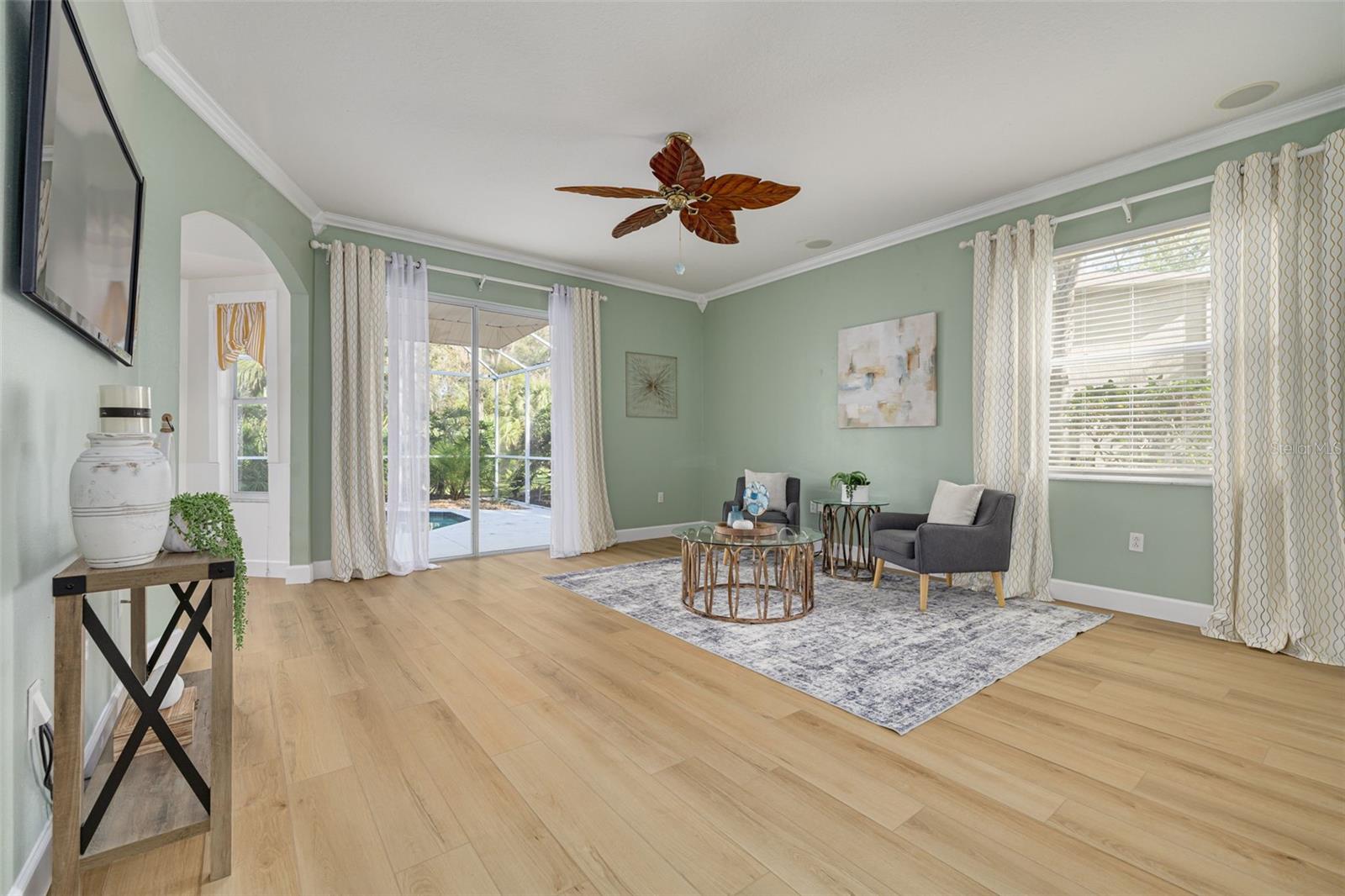 Family room with slider to pool