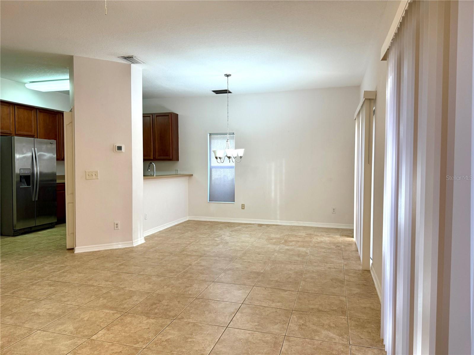 Great Room -- Dining Area -- Passing Food From Kitchen