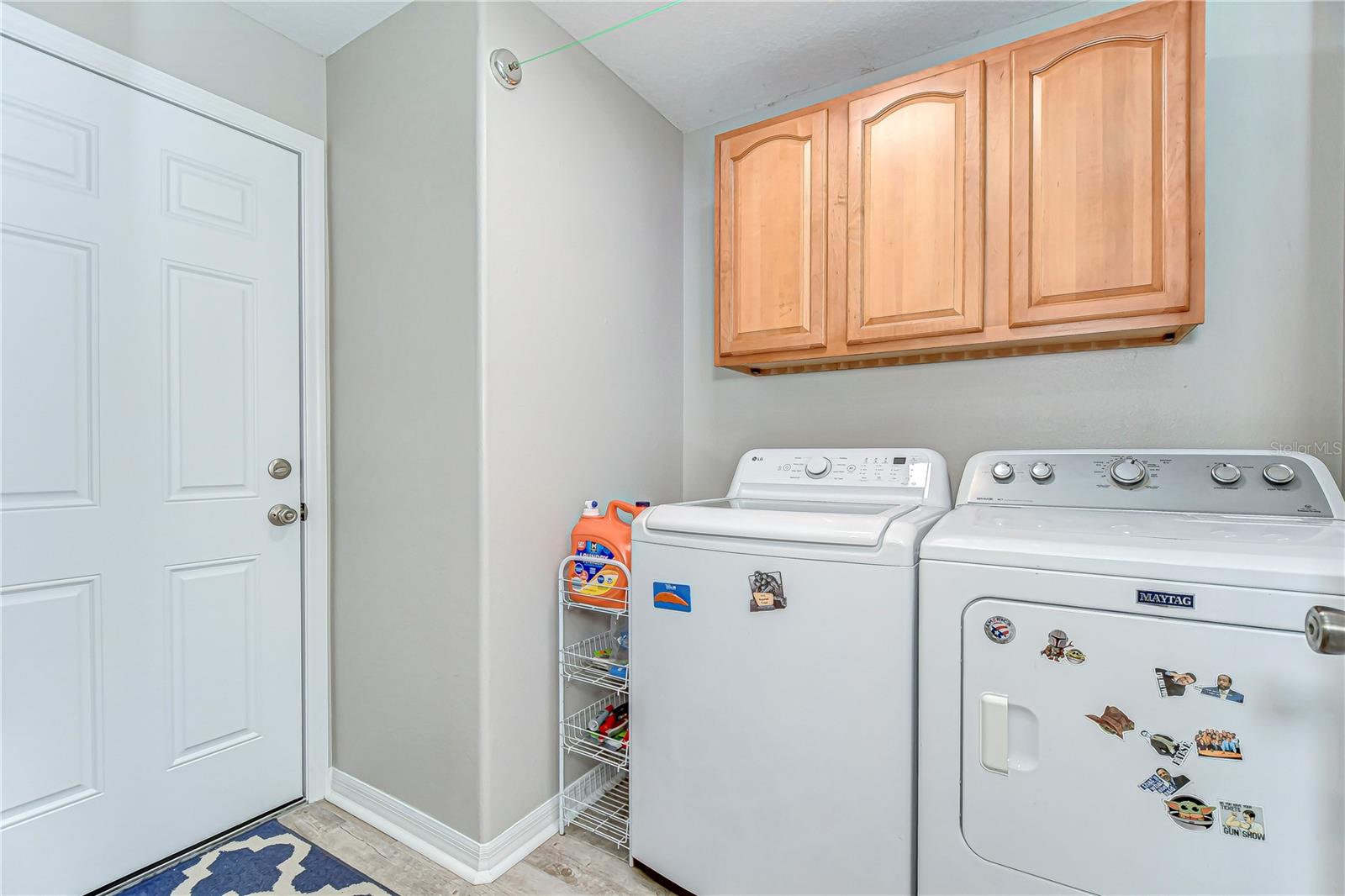 Laundry day made easy with this well-equipped utility room featuring