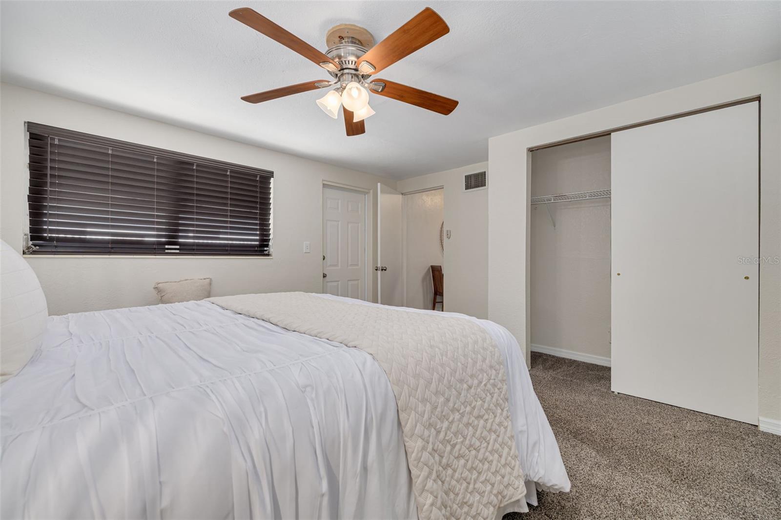 Primary bedroom with built-in closet