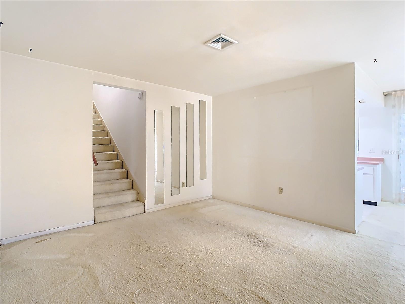 Living room view to stairway