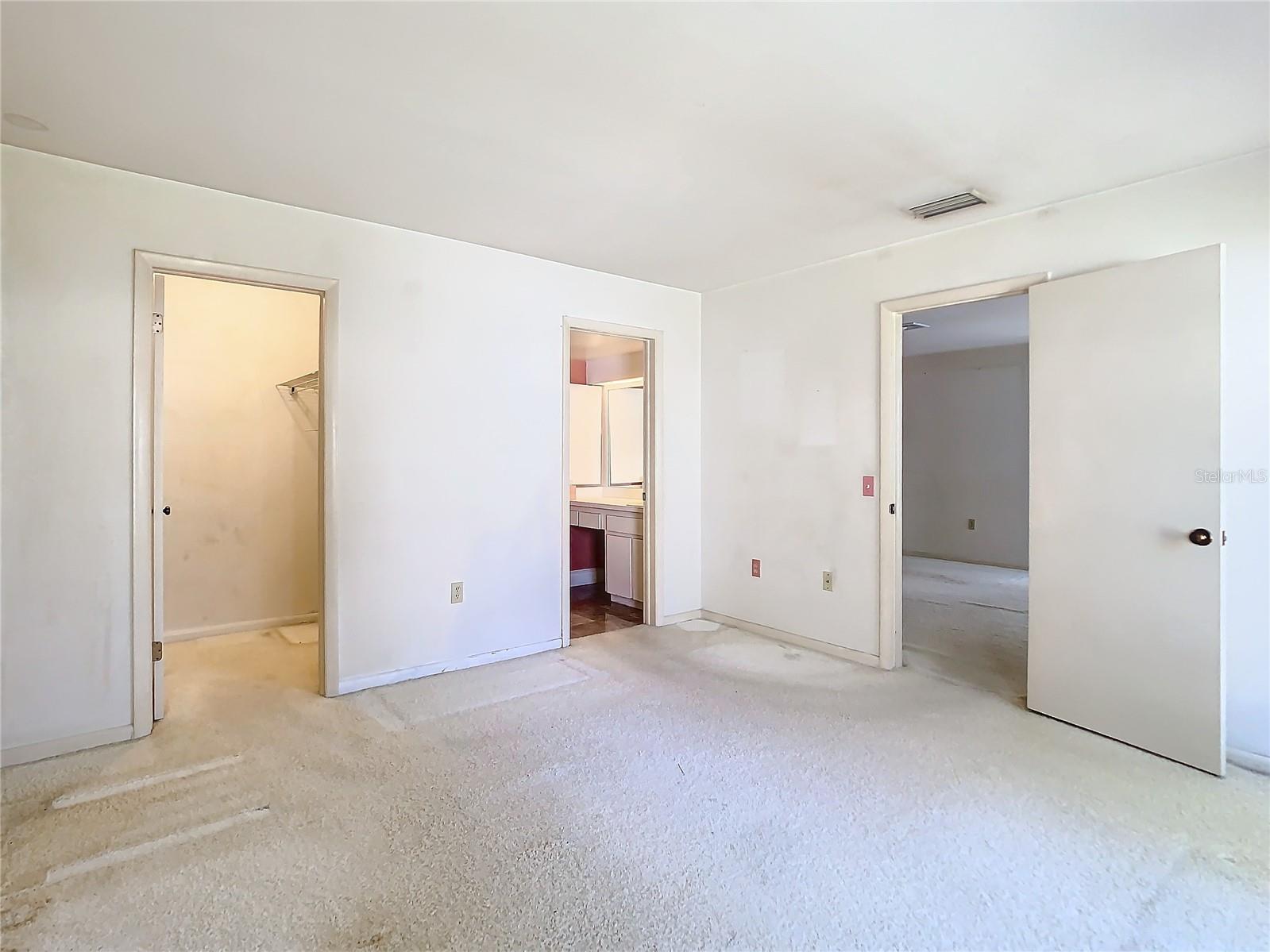 Bedroom 2 with ensuite bathroom and walk in closet