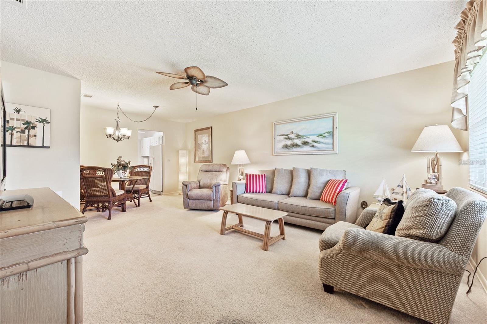 This condo has a living room and dining room combination.