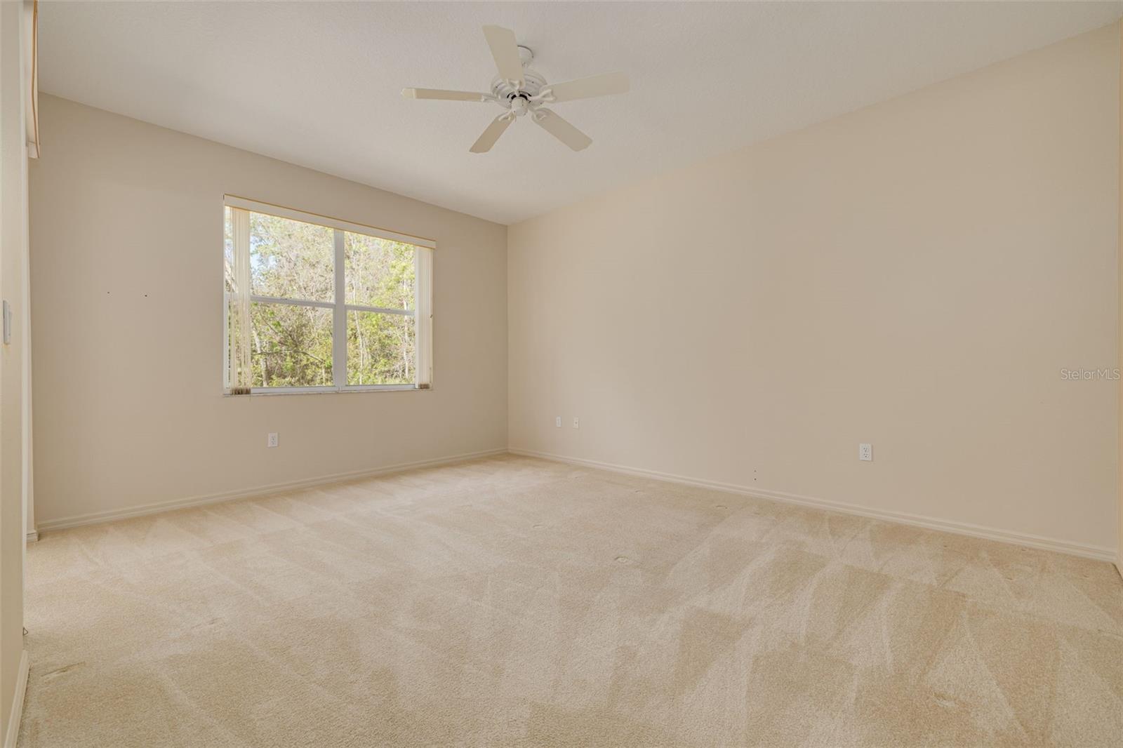 Primary bedroom with windows that overlook conservation!