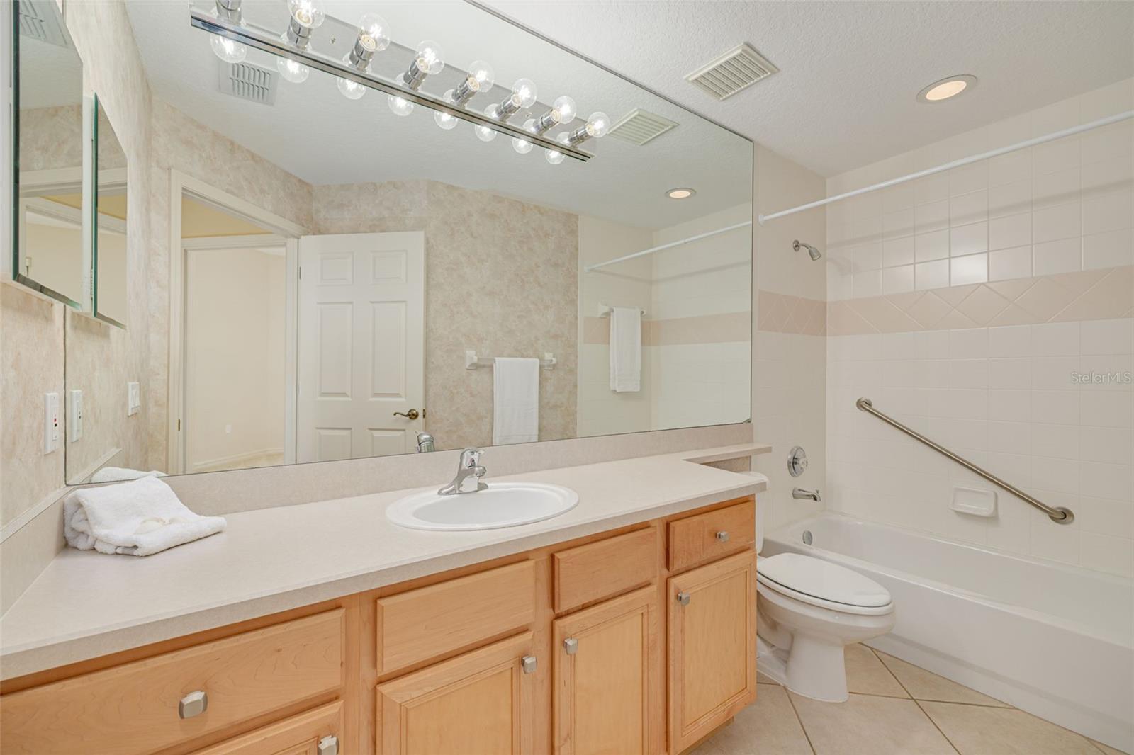 Hall bathroom with tub