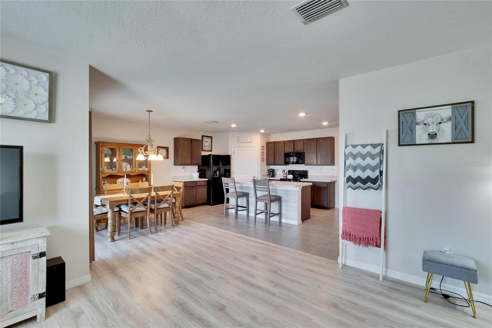 36707 Goffaux Loop family room with a view of kitchen and dining room