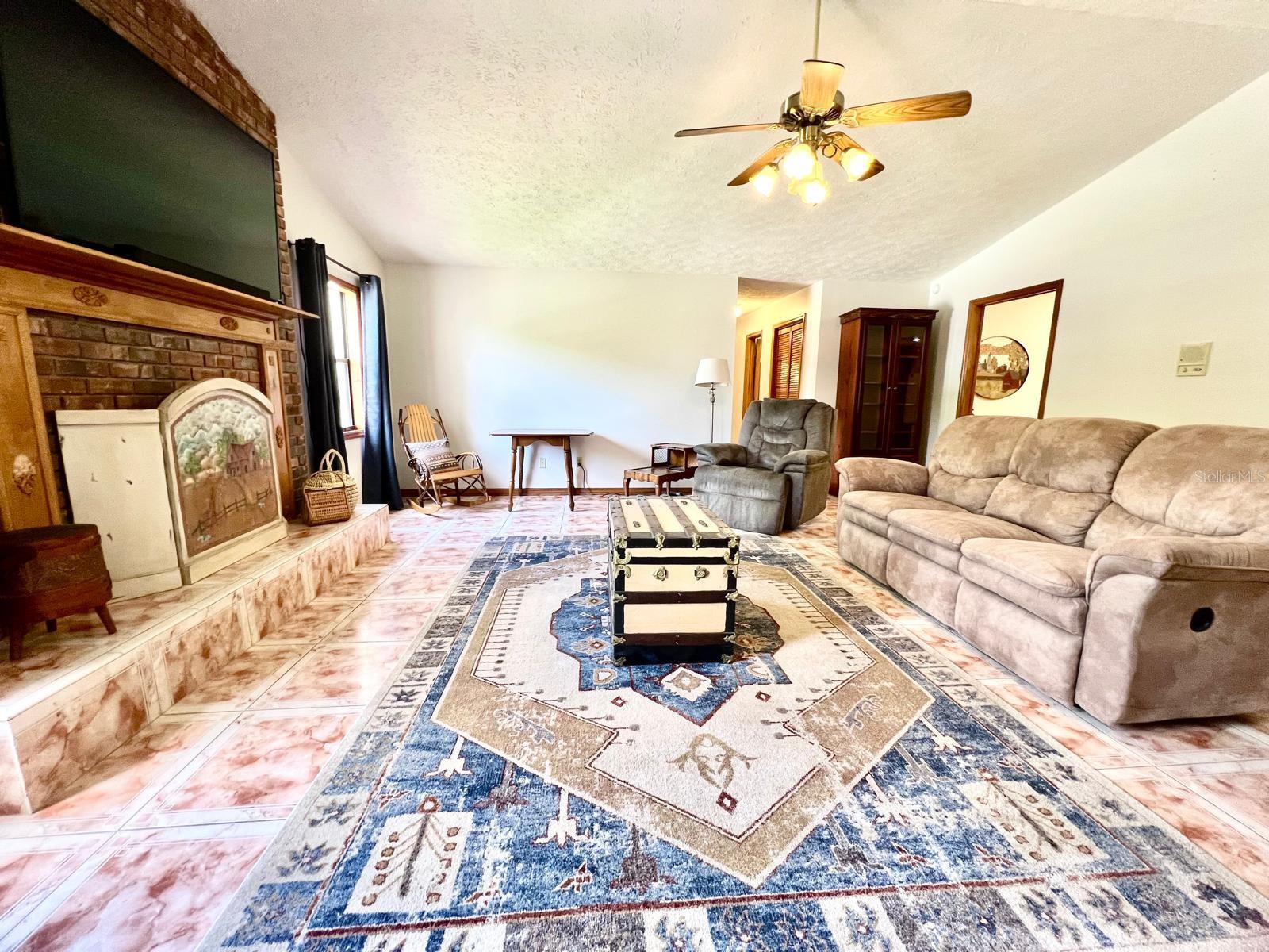 Family Room with wood burning Fireplace