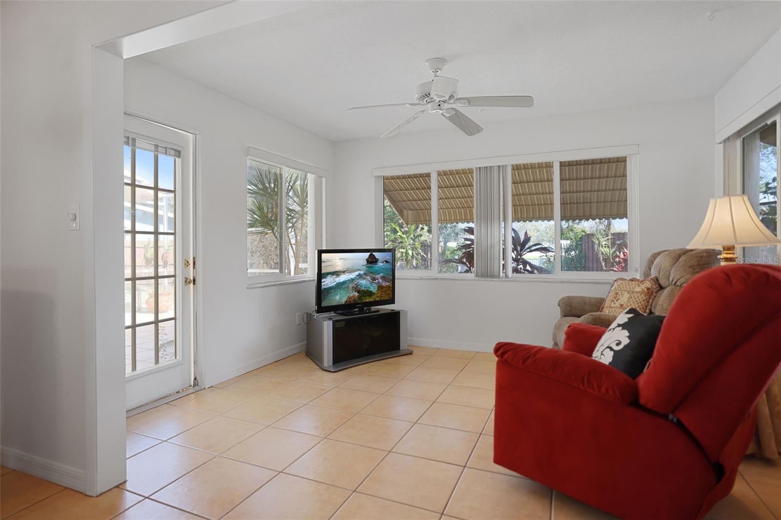 Family room Lots of natural light opens to screened lanai