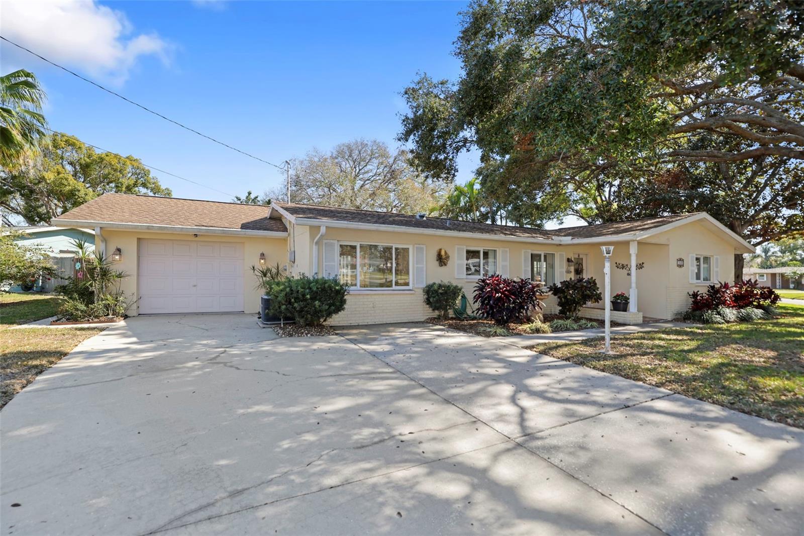1549 San Christopher Dr., Dunedin, FL 2 Bed, 2 Bath, 1 car garage with Lake view - Non - Evac Zone