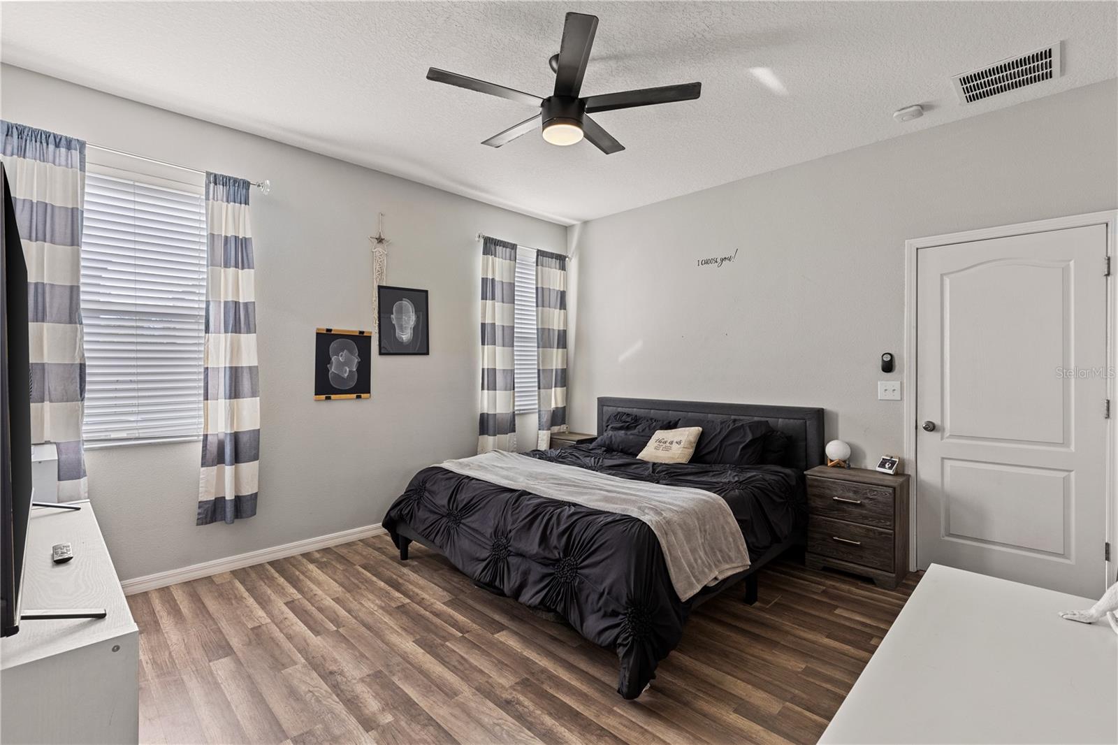 Primary bedroom with walk-in closet and ensuite