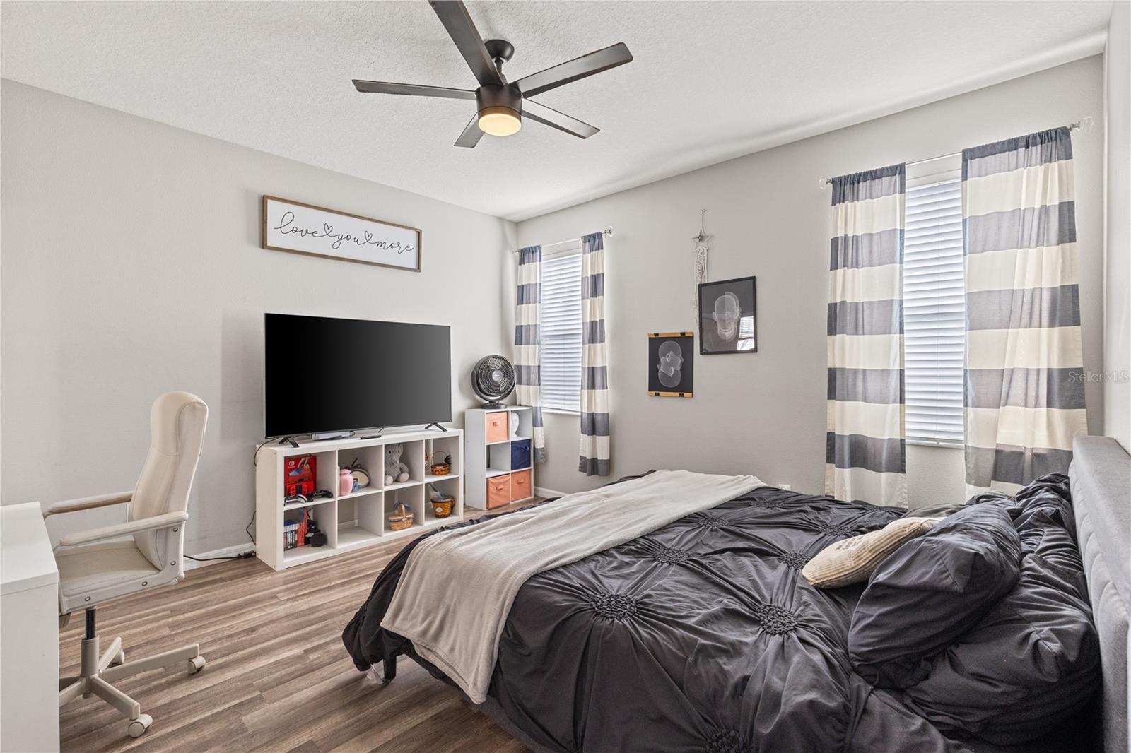 Primary bedroom with walk-in closet and ensuite