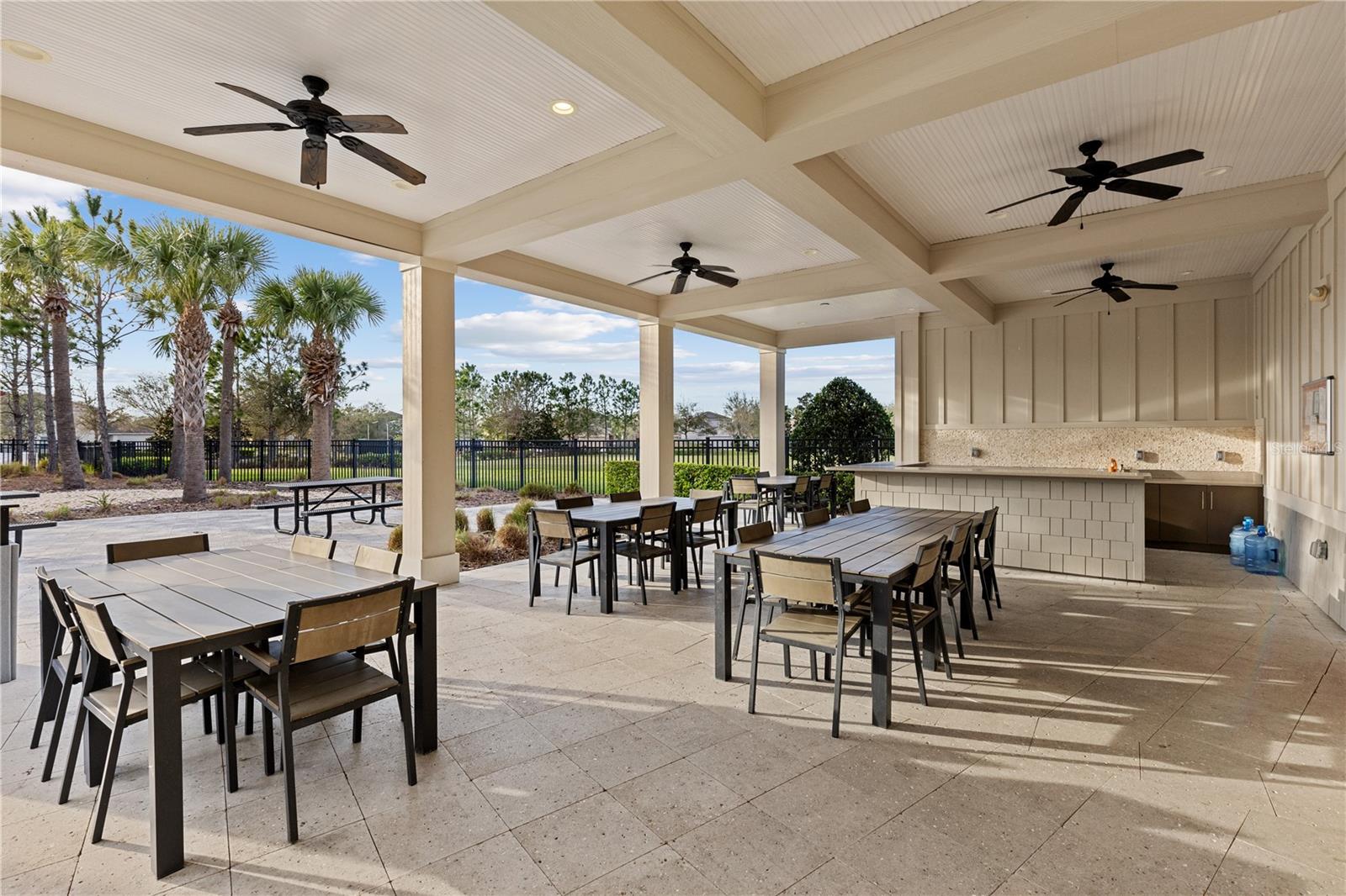 Host events in this covered community pool in the Cypress Creek Community.