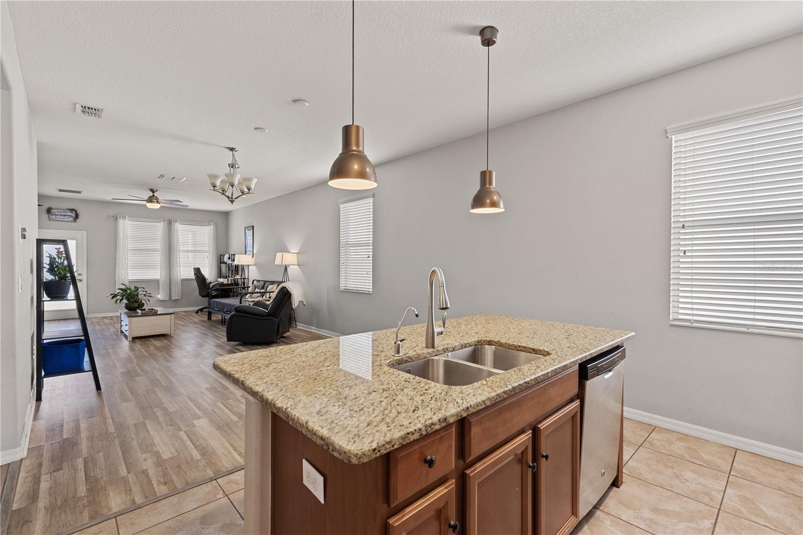 Granite counters and island for added convenience