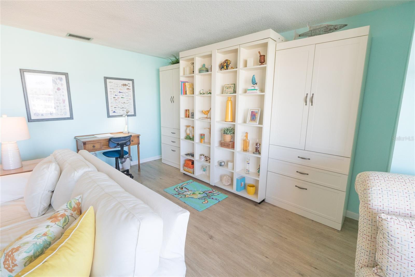 Custom Built-in Murphy Bed w/ storage in Main Living Area.