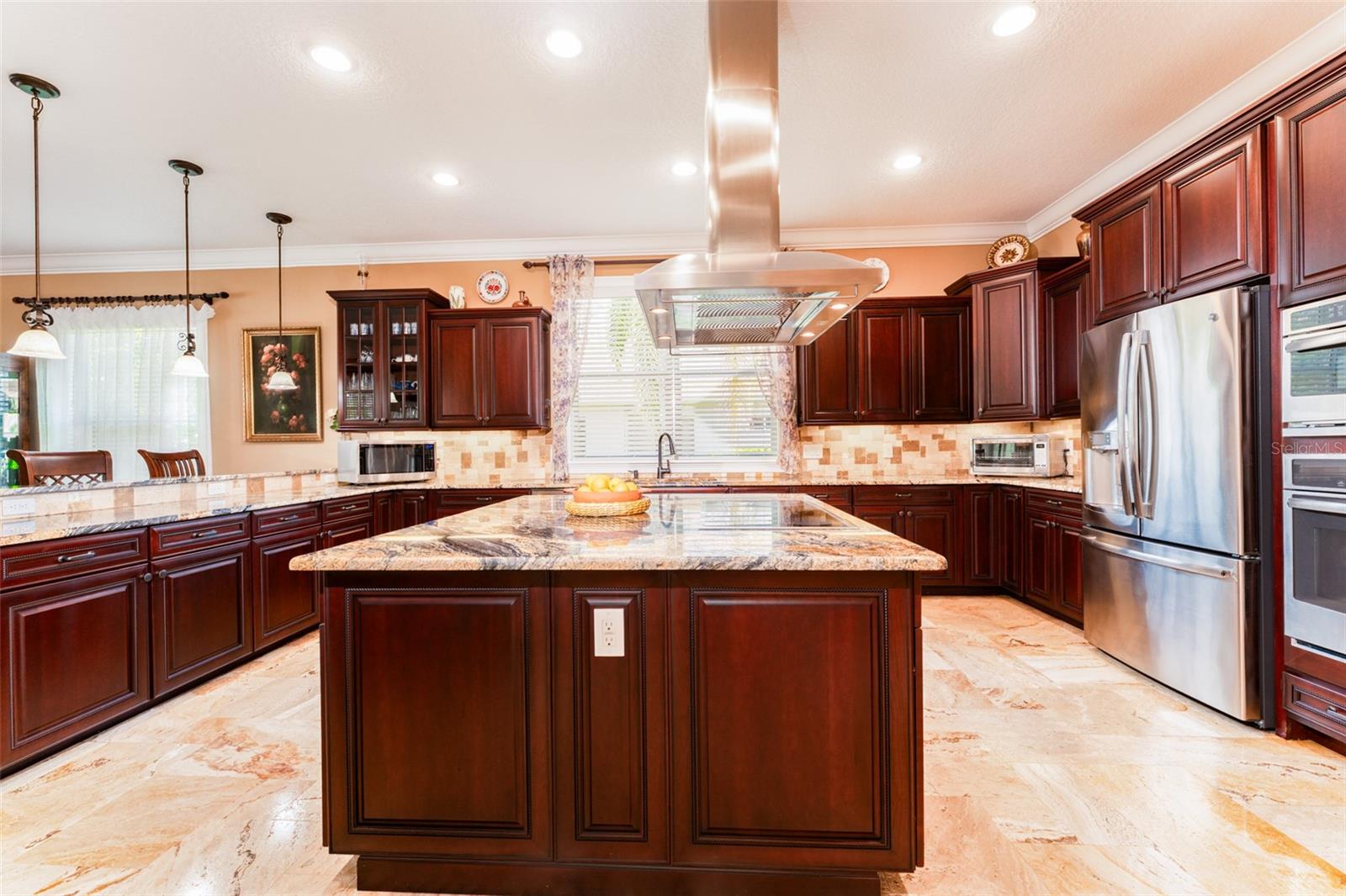 Recessed Cans, Window over Sink for Natural Light, Pendant Lighting over Bar