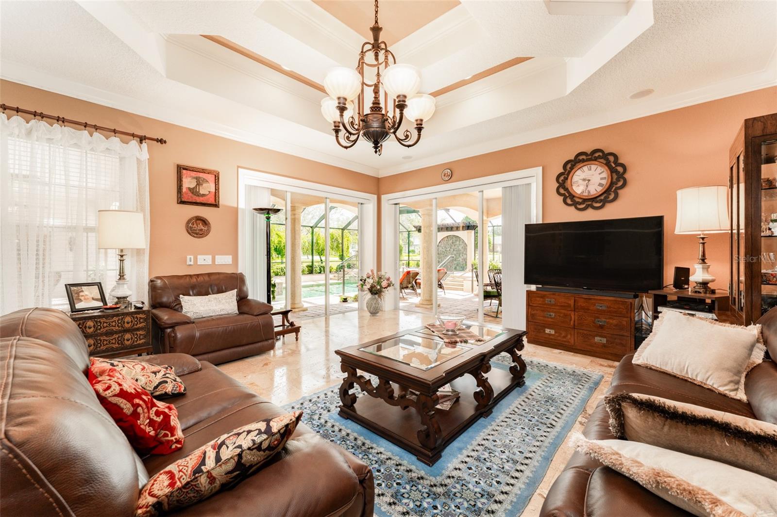 Family Room with Sliders Leading to Outdoor Living Space that Pocket Open all the way Extending your Living Space & Bringing the Outdoors in