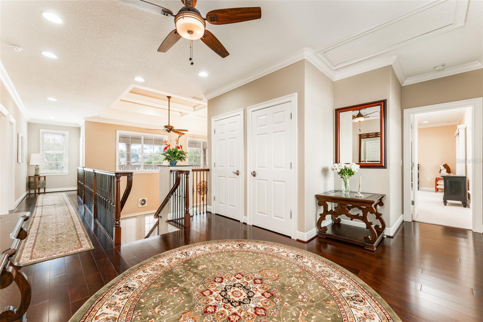 Upstairs Foyer with Rich Wood Flooring