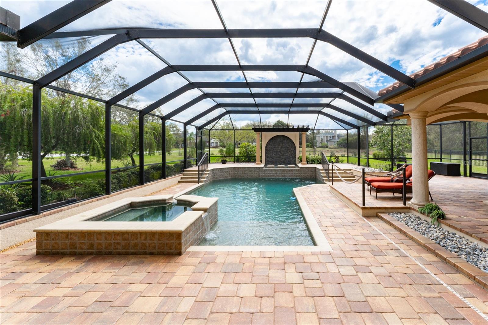 Sparking Natural Gas Heated Pool/Spa with Tremron Mega Old Town Brick Paved Flooring