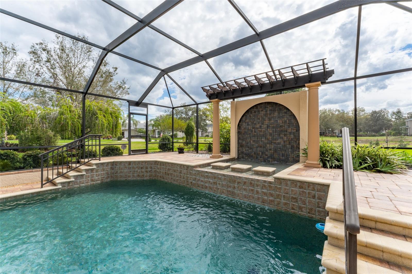 Pergola with Waterfall Backdrop