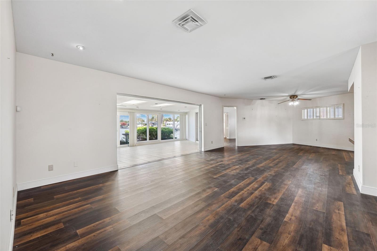 Modern entry door with a Mid-Century feel... enters into a open floorplan