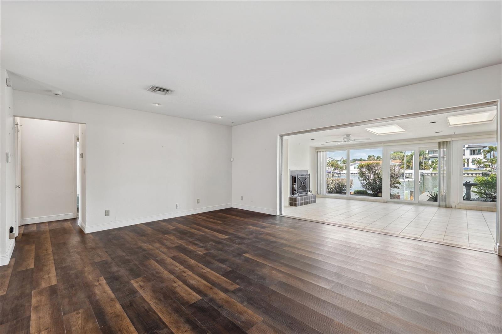 Modern entry door with a Mid-Century feel... enters into a open floorplan