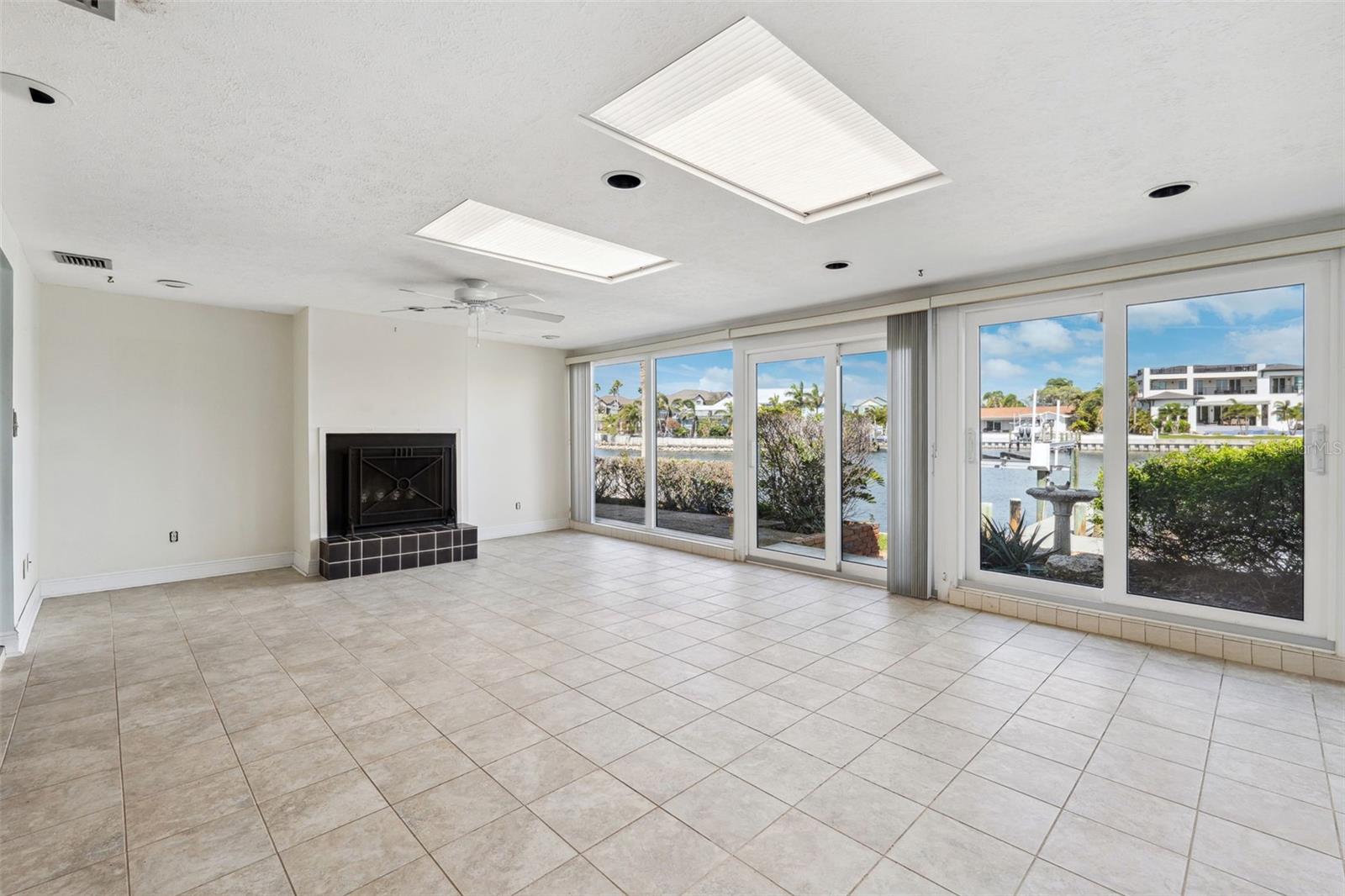 Wide open water view from the Family Room with fireplace