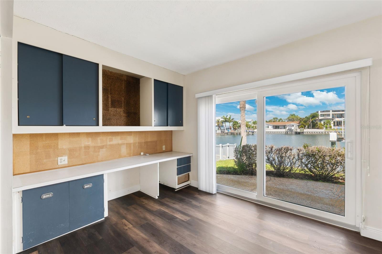 Bedroom 2 with attached bonus space overlooking the water