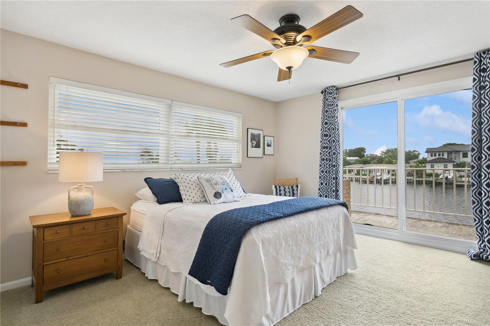 Bedroom 3 with patio and water views