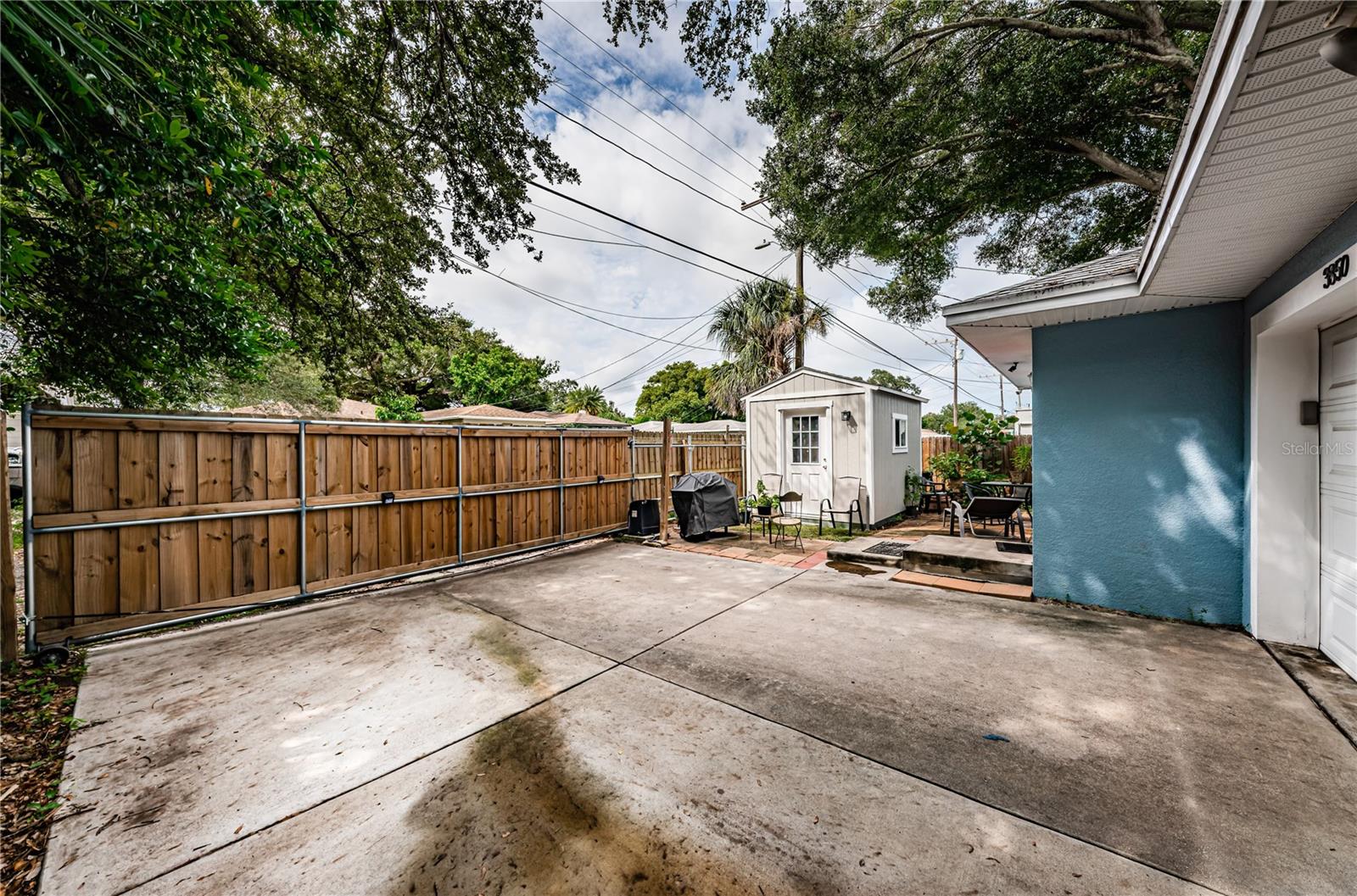 Wood Fencing with Remote Entry