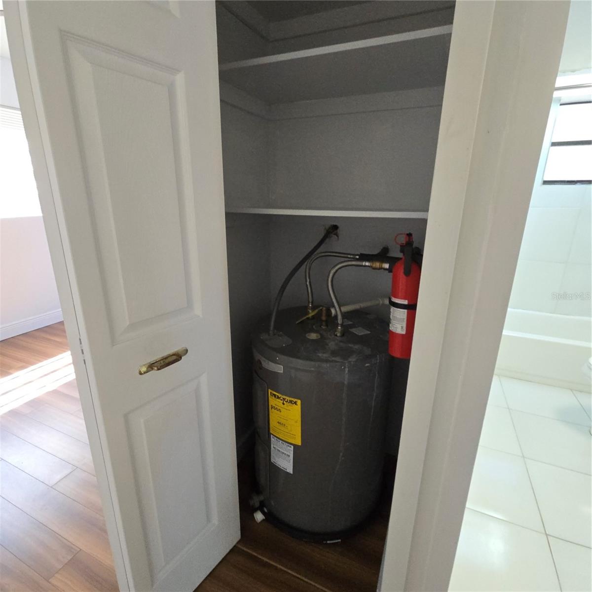 Water heater with store closet