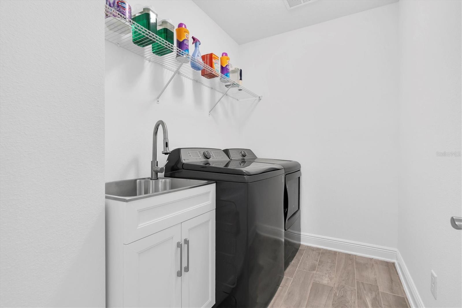 LAUNDRY ROOM WITH UTILITY SINK