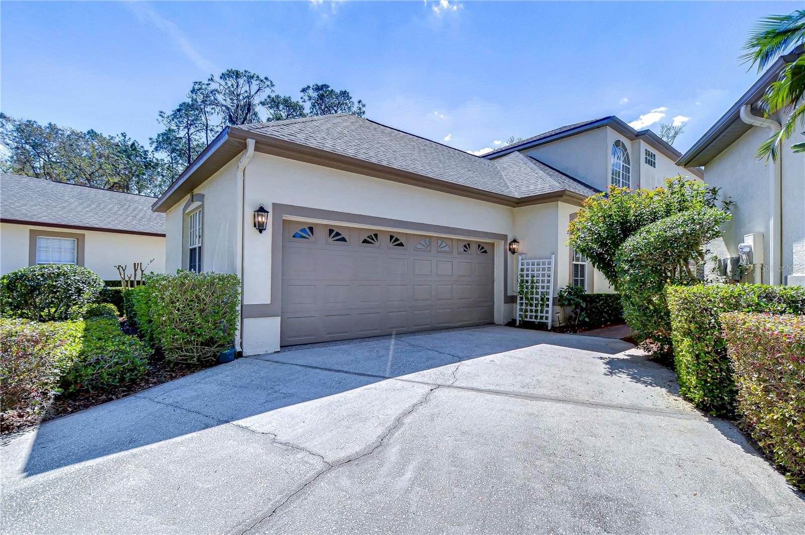 Nestled in the serene River Hills community, this charming home features a welcoming curb appeal.