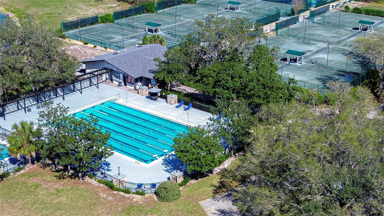 Dive into ultimate leisure with this stunning community hub offering a sparkling pool and top-notch tennis courts, perfect for embracing both relaxation and recreation right in your neighborhood.