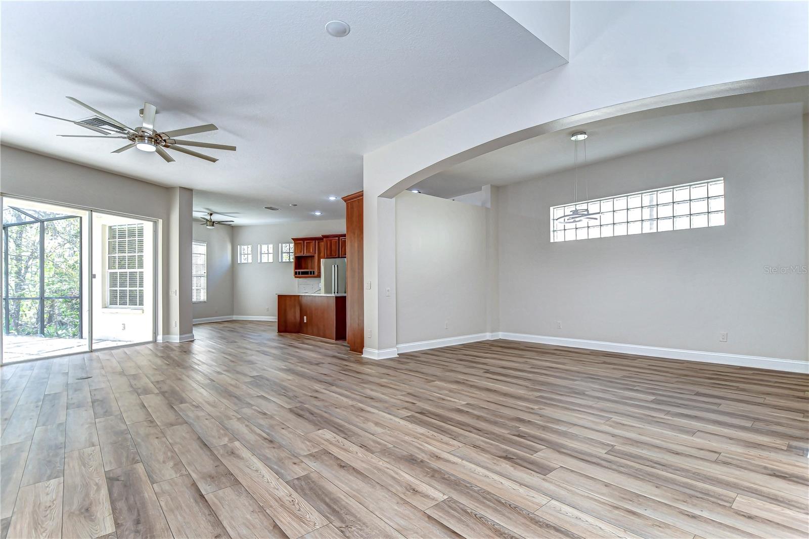 Discover the perfect blend of elegance and functionality in this open floor plan, featuring stylish flooring and abundant natural light.