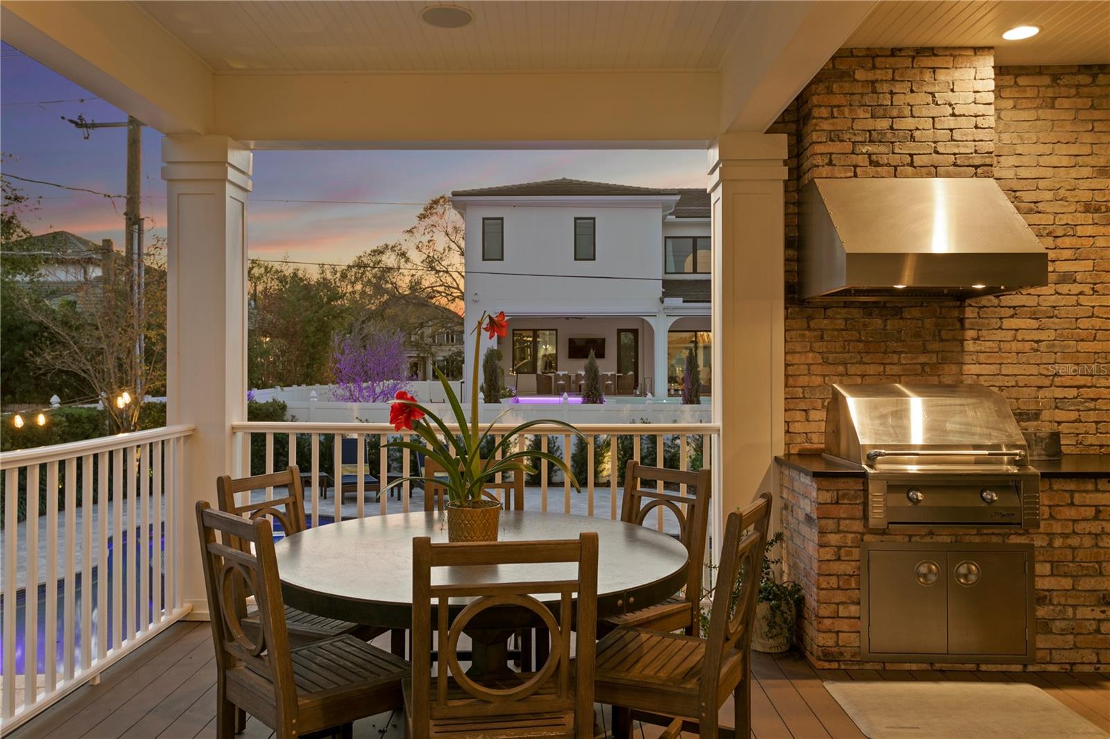 Florida evenings just got better in this Alfresco dining area . . . . .