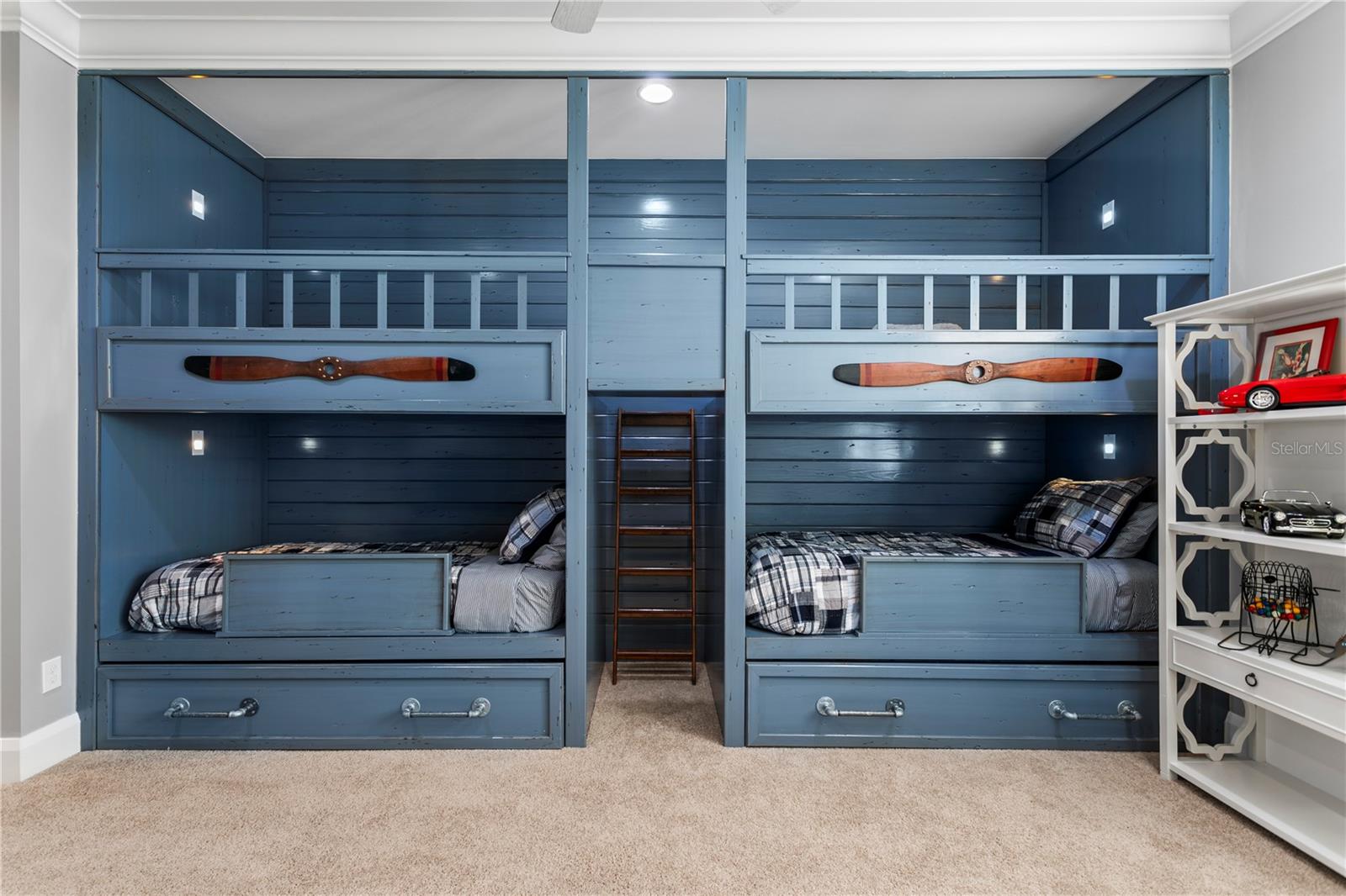 The fifth bedroom features a custom built bunk room