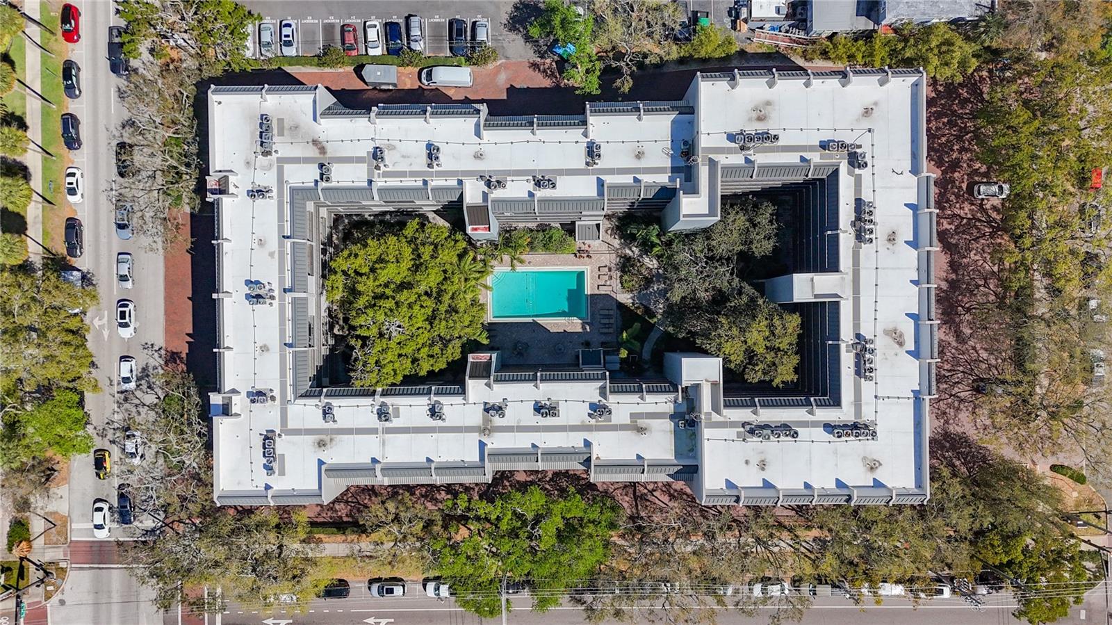 This aerial view of Townview shows its 74 units surrounding the landscaped courtyard and heated pool.