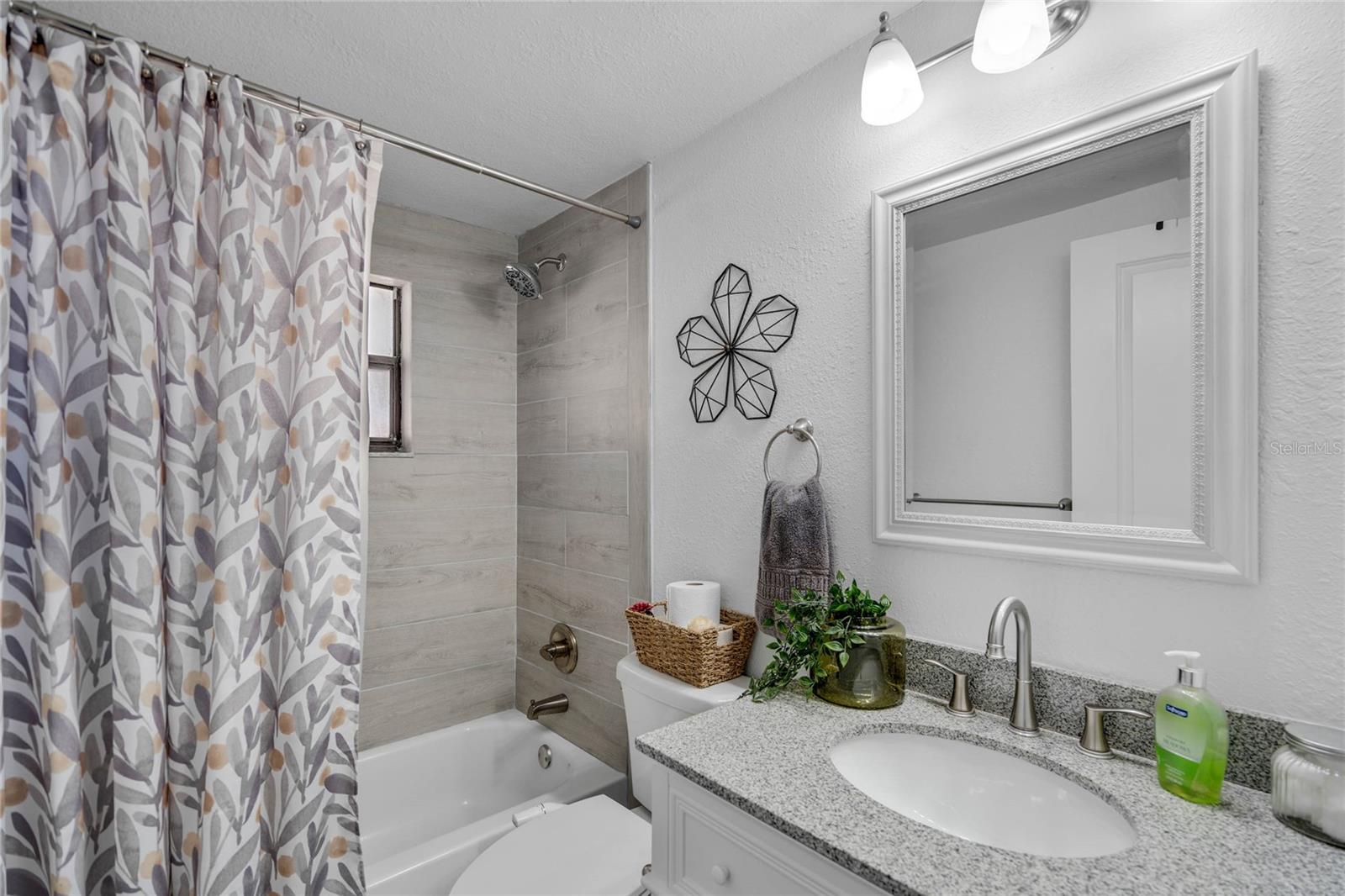 Guest bathroom with tub/shower combo