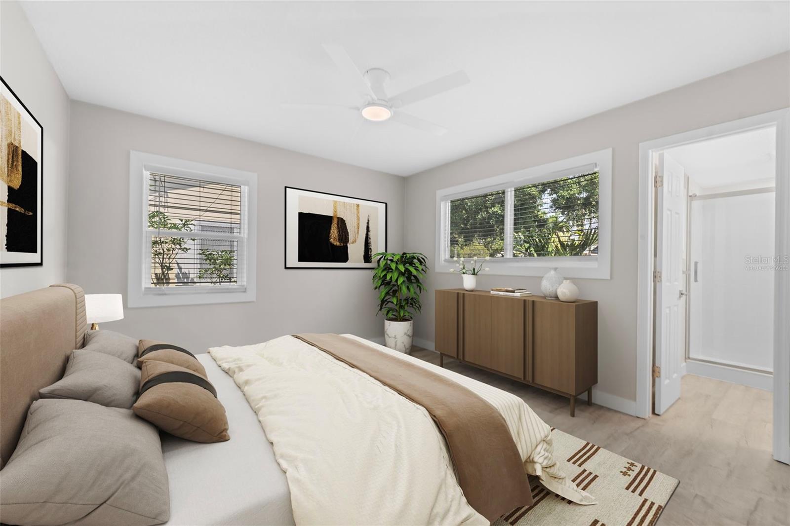 virtually staged primary bedroom with ensuite bathroom