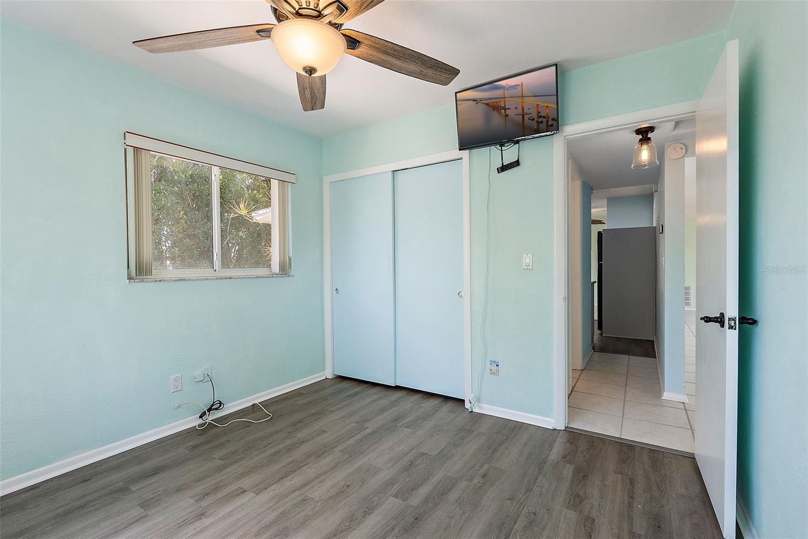 2ND BEDROOM - LOOKING DOWN HALLWAY TOWARDS KITCHEN