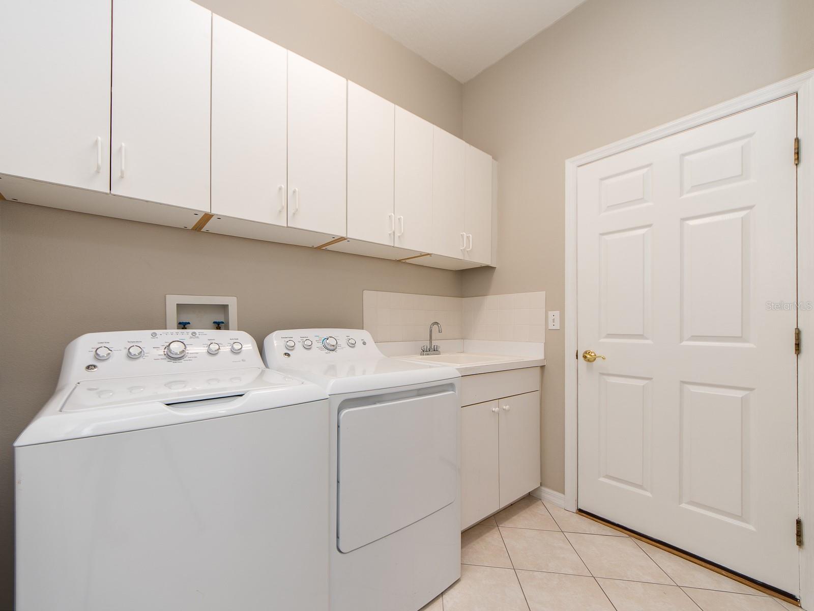 LAUNDRY WITH FULL SIZE WASHER AND DRYER