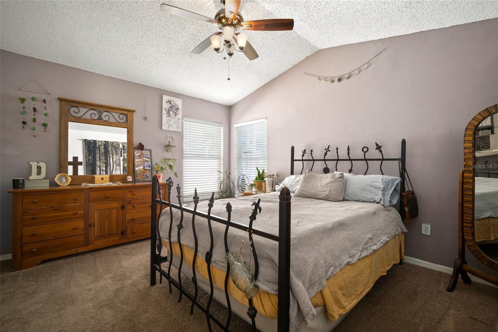 Primary bed with sliding door to porch