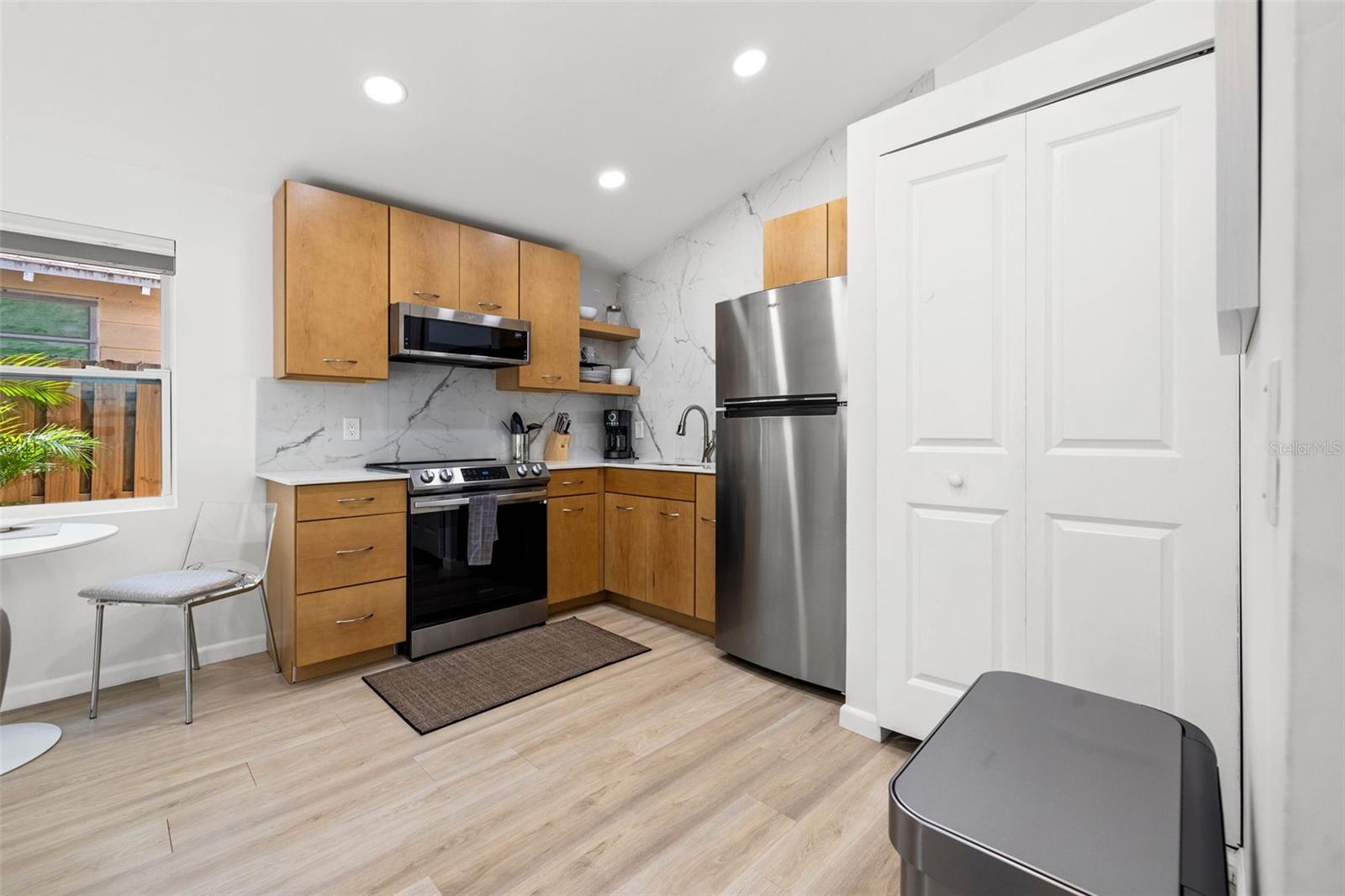 Full -size washer and dryer in laundry closet