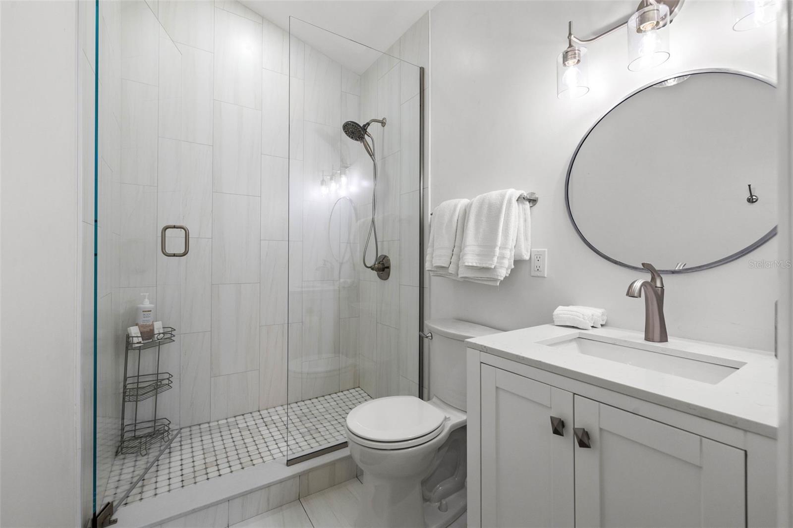 Large bathroom with walk-in shower