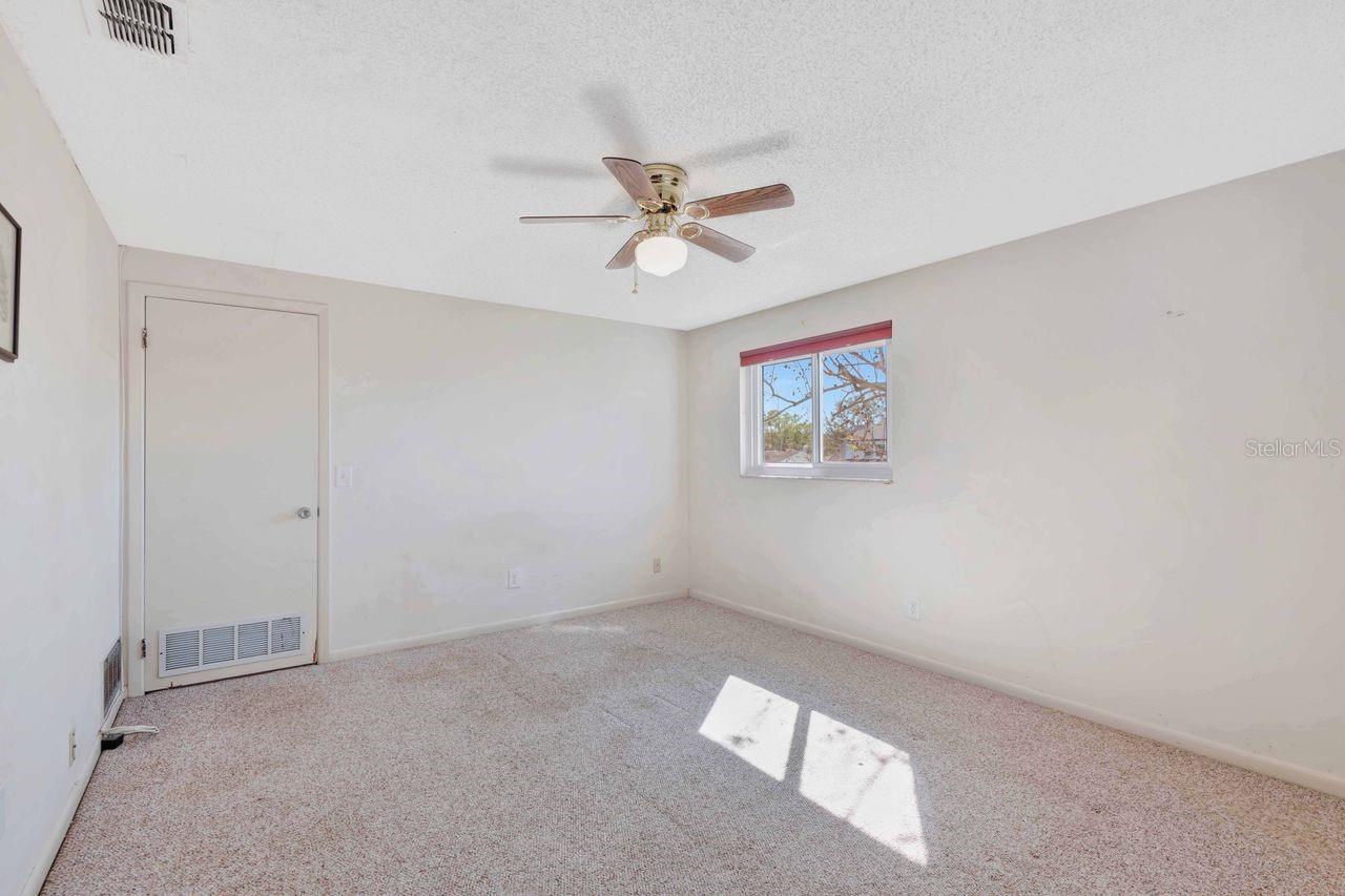 Upstairs bedroom #4 is large and features a bonus room.