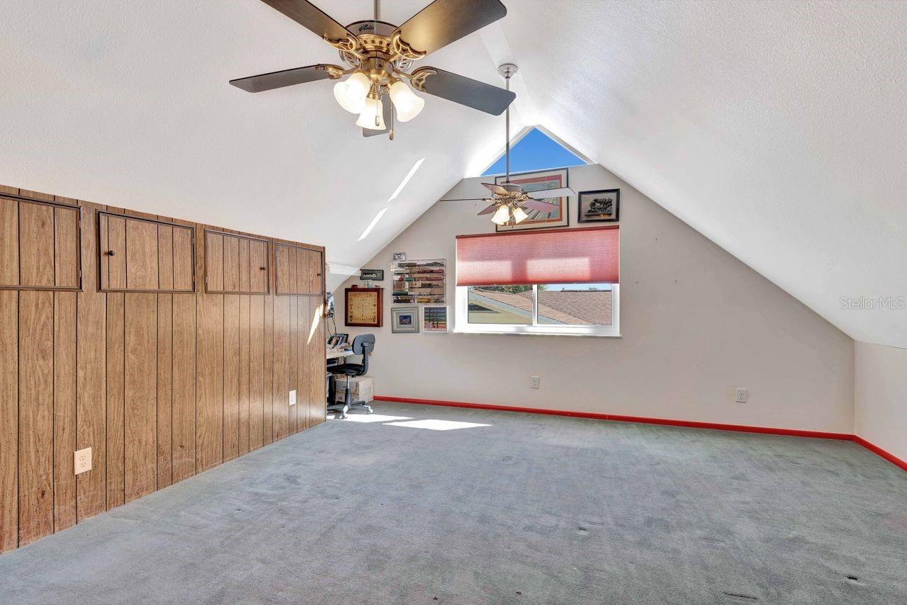 This bonus room adjoins bedroom #4 for a playroom or hobby room.