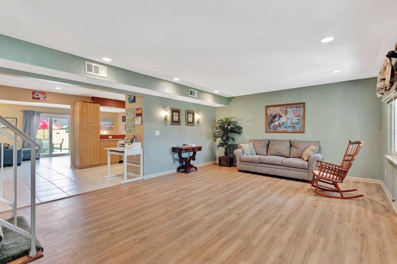 The front door opens onto a large formal living room.