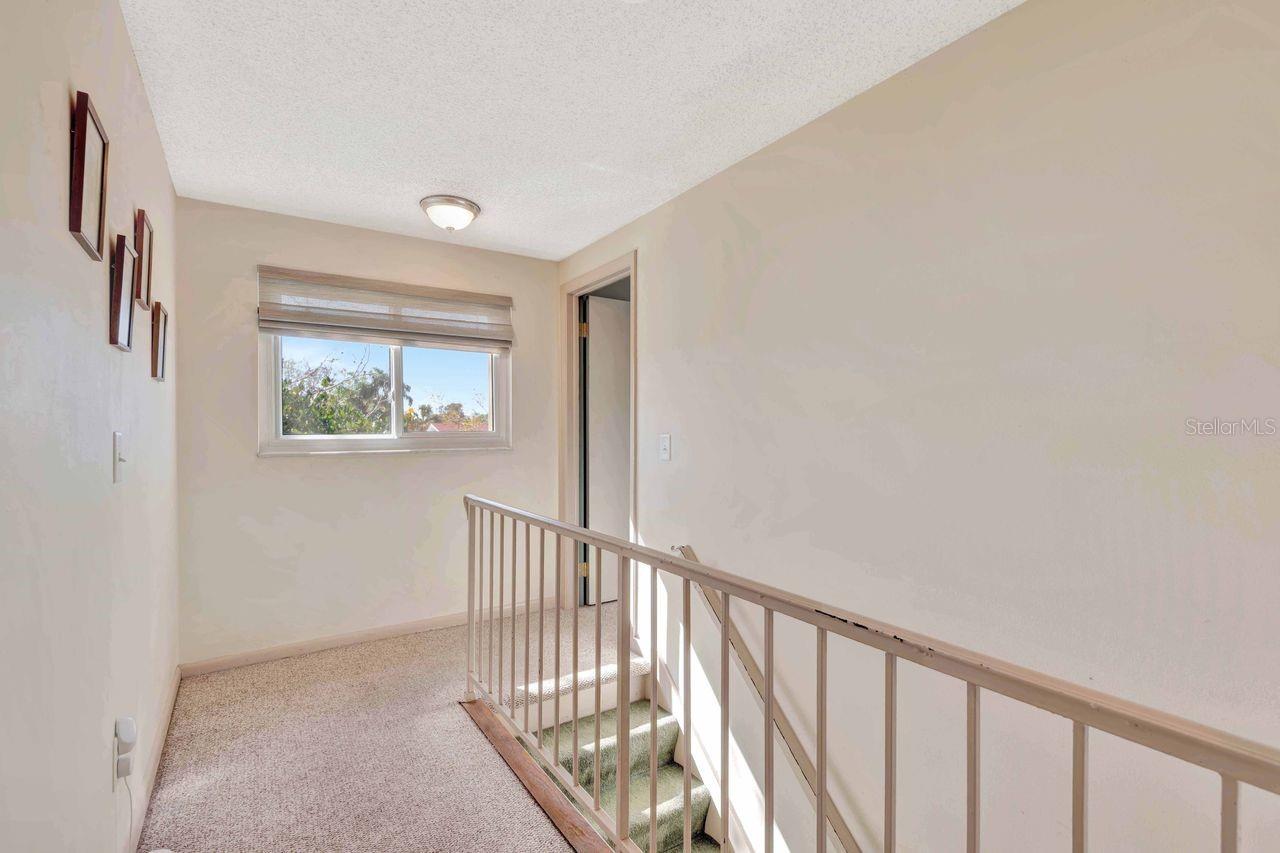 Staircase to upstairs bedrooms.