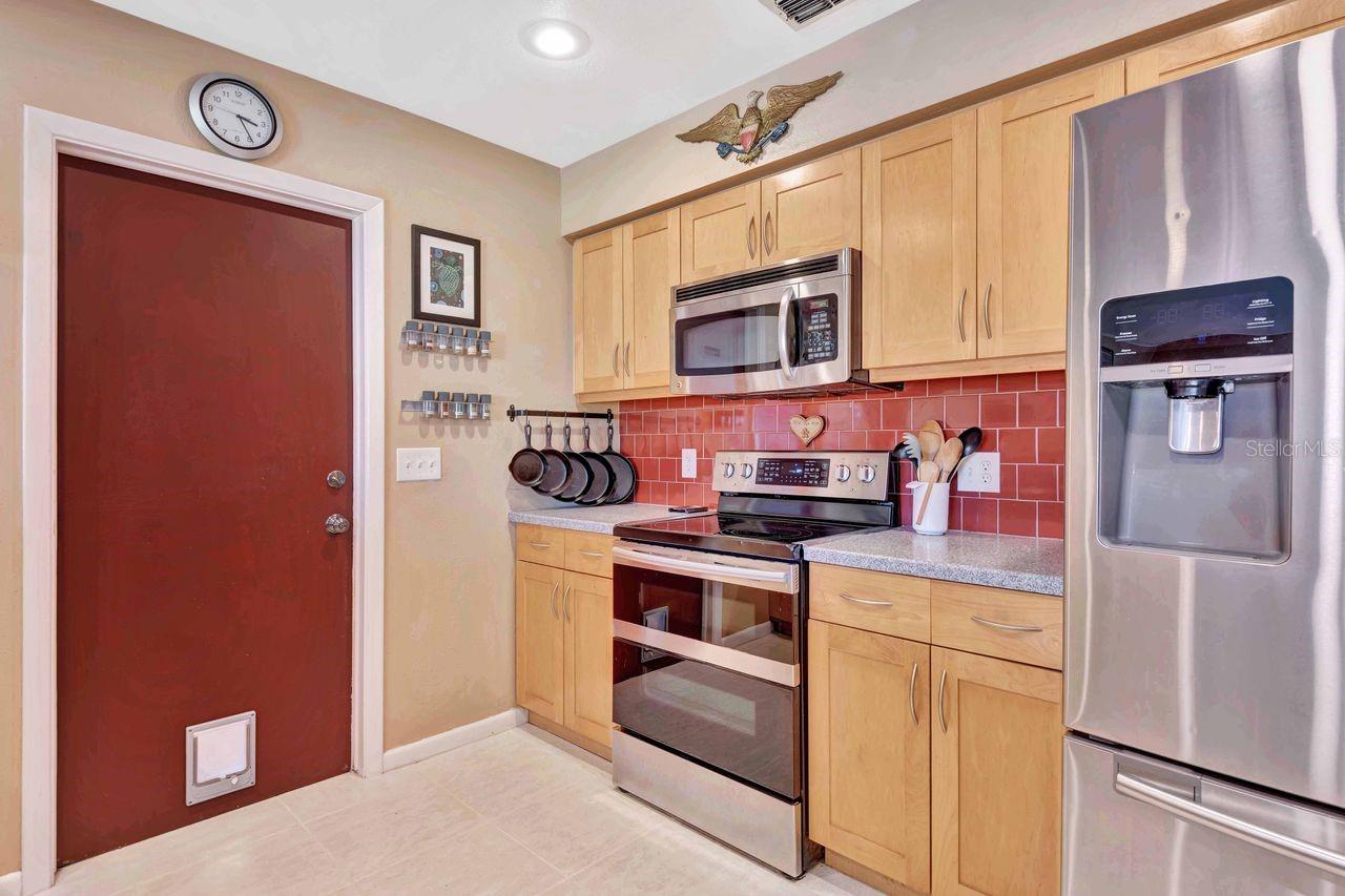 There is a utility room off the kitchen.